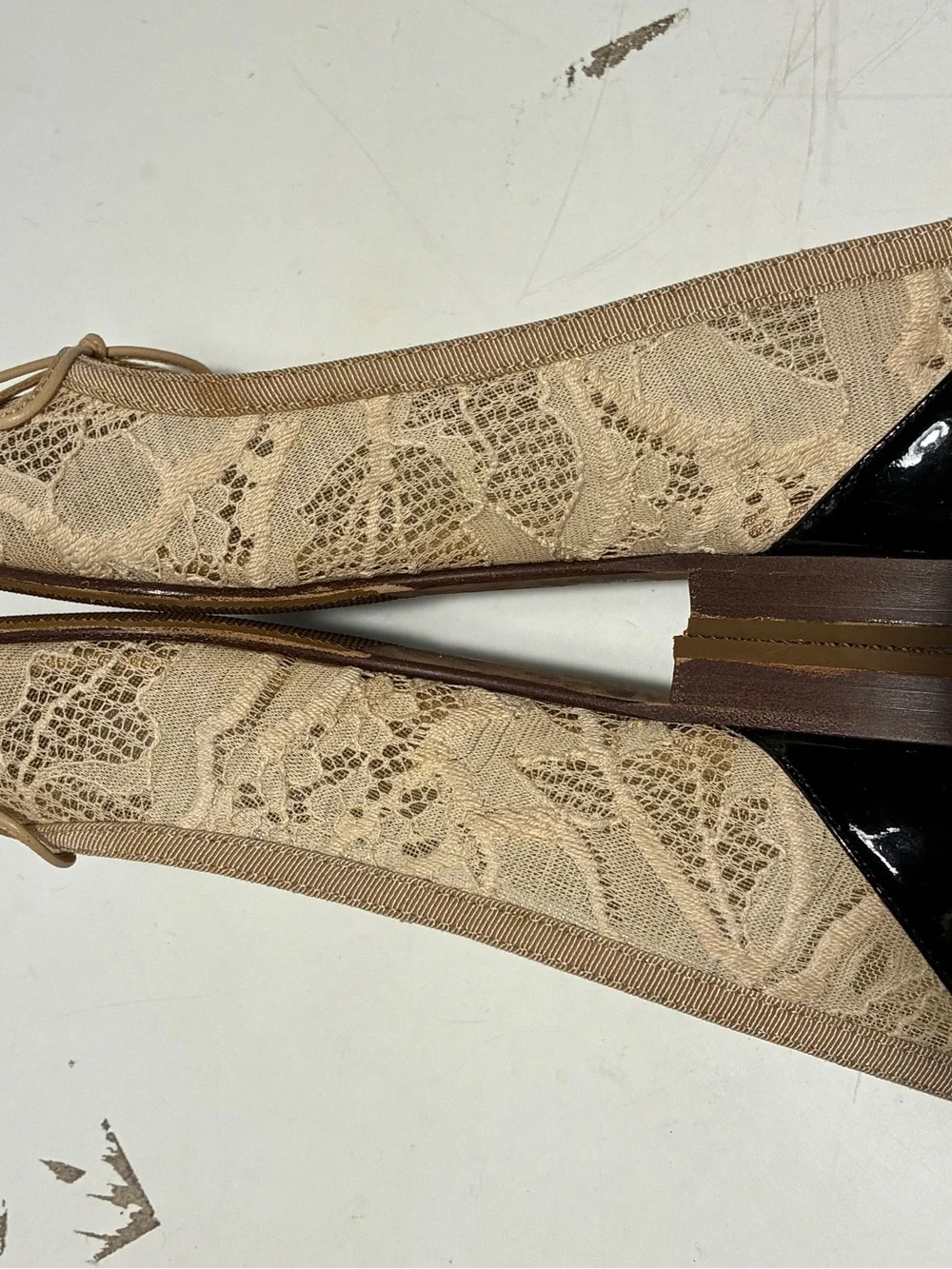 CHANEL Beige Lace Ballet Flats with Black Patent Cap Toe and Bow